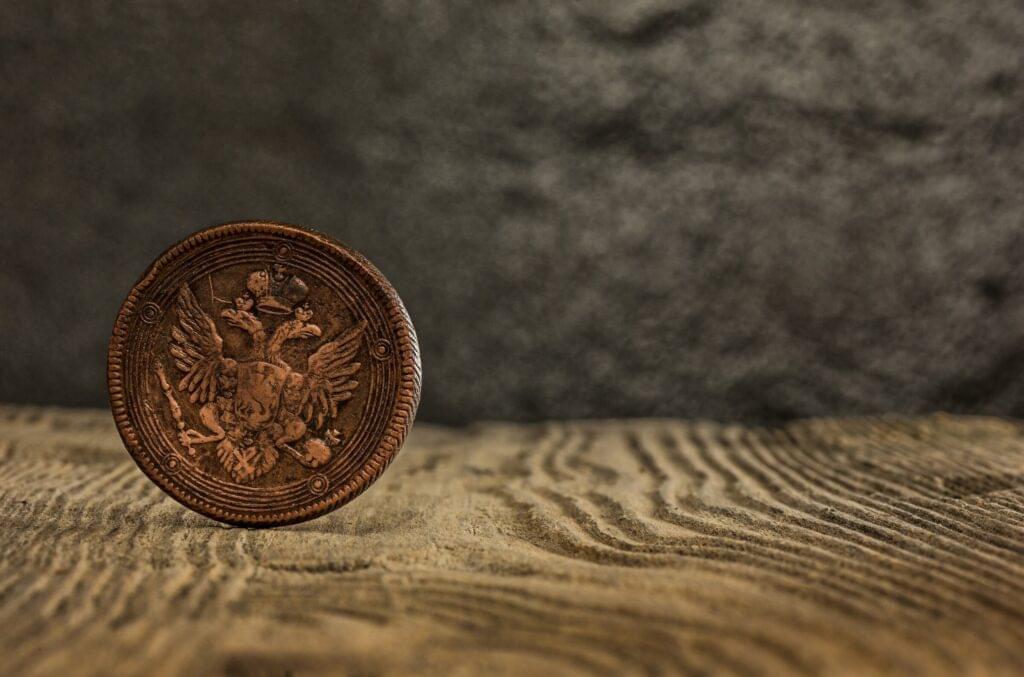 closeup old russian coin wooden
